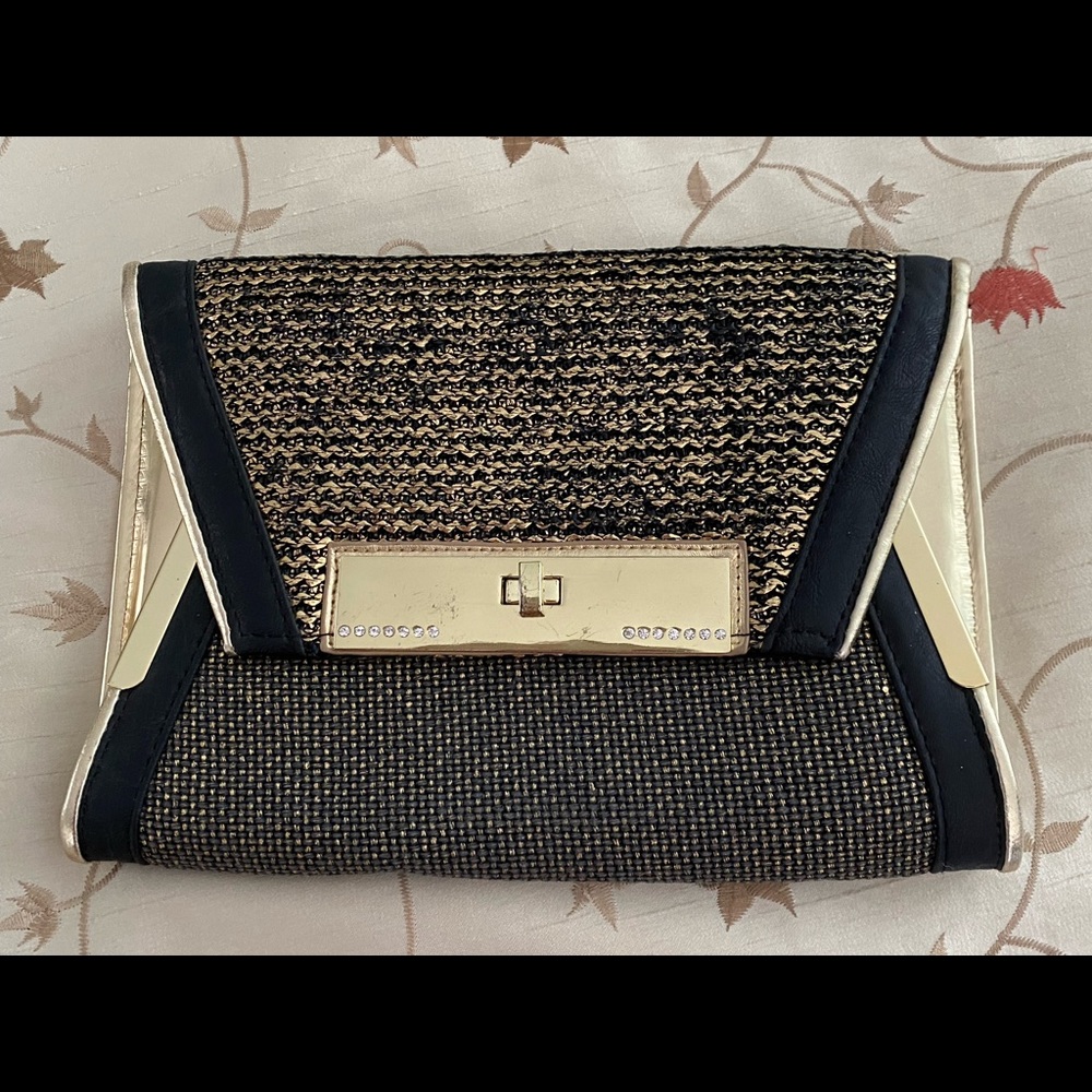 Beautiful golf and black clutch bag